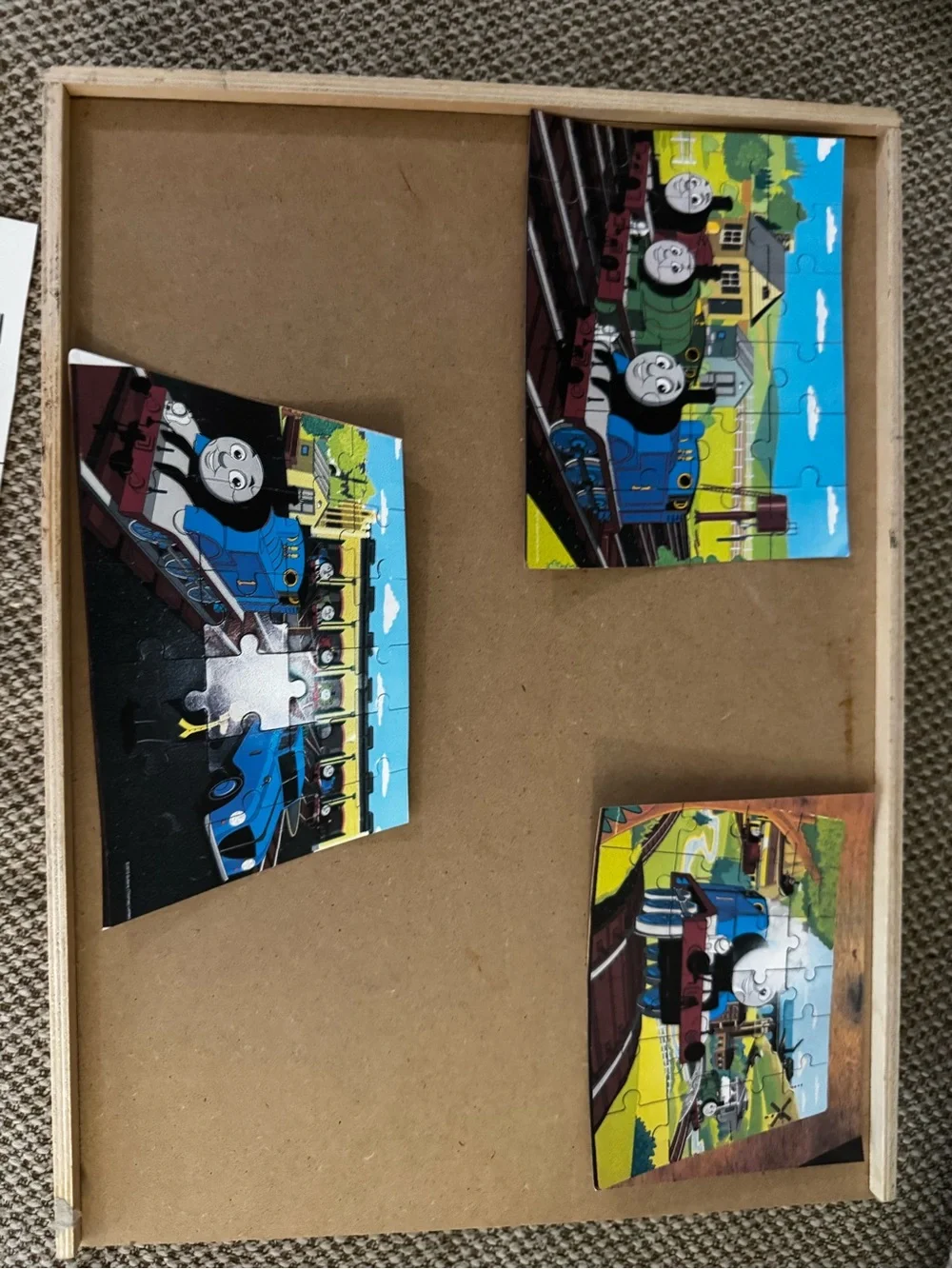 Thomas & Friends Colorful Blue Train Puzzle Pieces in Wood Organizer